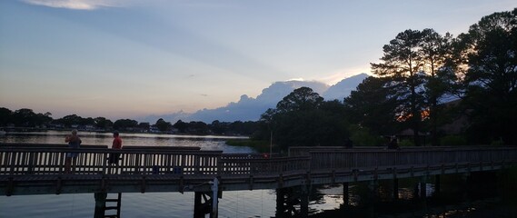 Dramatic sky over pier