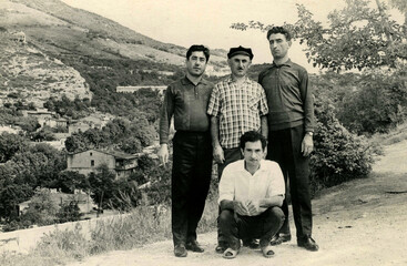 Old portrait of a four brothers. The shot was taken 1968 year.