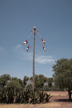 View of ancient ceremony Mayan Flying Pole Dance at Teotihuacan, Mexico
