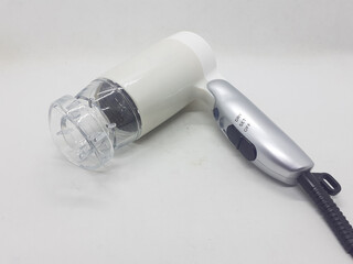 Woman Beauty and Fashion Device Accessories Hair Dryer in White Isolated background