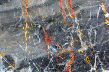 Red, white and yellow patterned natural of dark gray marble texture, abstract background