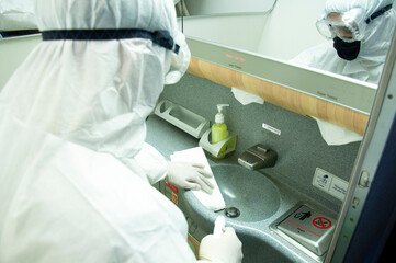 Coronavirus pandemic virus prevention. Airlines interior cabin deep cleaning for Covid-19.