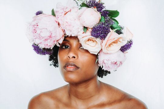 Black woman with afro and flower crown
