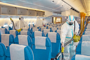 Coronavirus pandemic virus prevention. Airlines interior cabin deep cleaning for Covid-19.