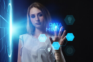 Business, Technology, Internet and network concept. Young businessman working on a virtual screen of the future and sees the inscription: Data mining