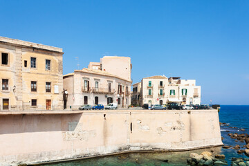 Fototapeta na wymiar Sicily landscape, View of old buildings in seafront of Ortygia (Ortigia) Island, Syracuse, Sicily, Italy.