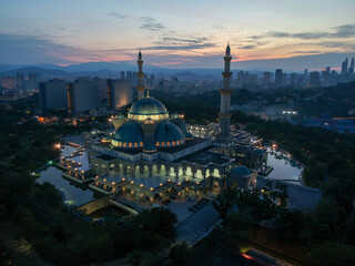 Beautiful and dramatic aerial view of The Federal Territory Mosque or “Masjid Wilayah Persekutuan”, Kuala Lumpur Malaysia in the morning.