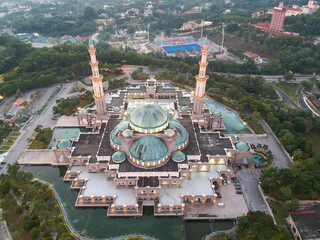Beautiful and dramatic aerial view of The Federal Territory Mosque or “Masjid Wilayah Persekutuan”, Kuala Lumpur Malaysia in the morning.