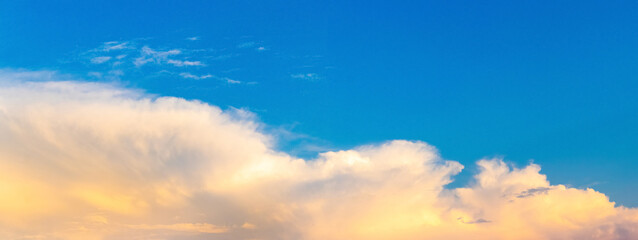 Fototapeta premium Panorama with light chimars on the blue sky before sunset