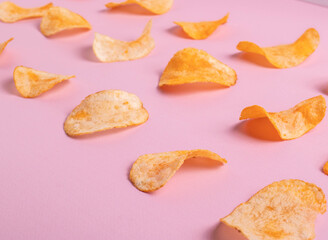 golden cruchy crisps on pink