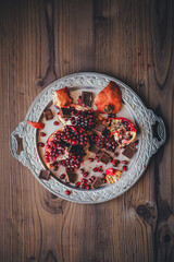 pomegranate on a silver plate