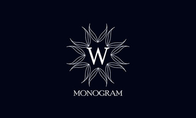 Creative monogram design with letter W on a black background. Sample logo for antiques, restaurant, cafe, boutique, hotel, heraldry and jewelry.