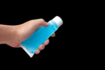 Hand wash with Alcohol gel or Hand sanitizer gel for prevent coronavirus, New normal hygiene concept. Isolated on black background, Close-up