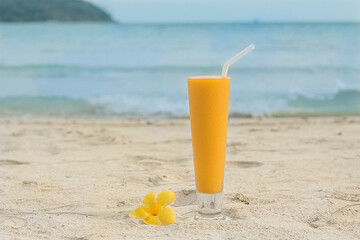 orange juice on the beach