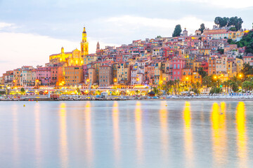 Menton mediaeval town on the French Riviera in the Mediterranean during sunset, France.
