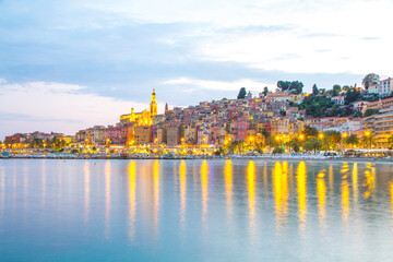 Menton mediaeval town on the French Riviera in the Mediterranean during sunset, France.
