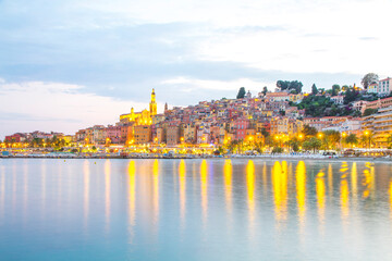 Menton mediaeval town on the French Riviera in the Mediterranean during sunset, France.
