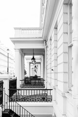 A row of typical Victorian facades found in the better living areas in London - creative black and...