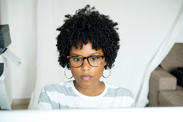 Young smart black woman wearing glasses