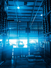Warehouse cargo building store, warehouse interior with shelves, pallets and boxes for stock and sorting shipment goods in freight, logistics and transportation industrial