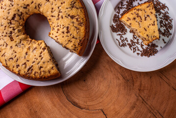 .Traditional Brazilian cake called Bolo Formigueiro. Vanilla cake with chocolate sprinkles. .Accompanied by a cup of coffee