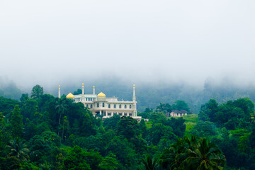 Beautiful mosque in the hill surrounded by forest