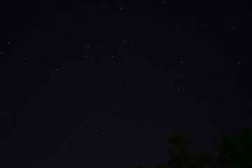 Space background on the desktop, screensaver. Night starry sky of the Northern hemisphere. Various cosmic bodies and constellations. The stars are like small bright lights.