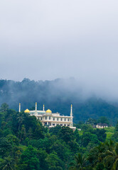 Beautiful mosque in the hill surrounded by forest