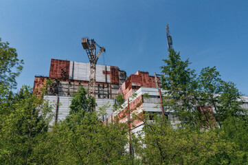 Fototapeta na wymiar Reactors building 5 and 6 in Pripyat, Chernobyl exclusion Zone. Chernobyl Nuclear Power Plant Zone of Alienation in Ukraine