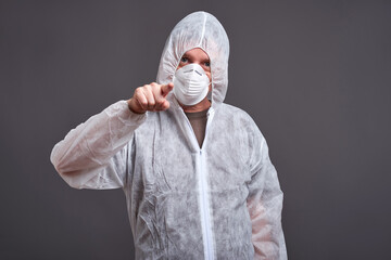 Man in a clothes protector suit