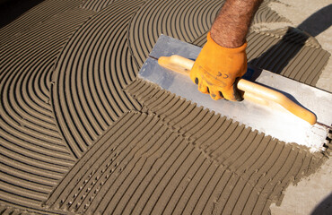 glue floors spread with notched trowel
