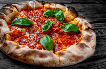 Pepperoni Pizza with Mozzarella cheese, salami, Tomato sauce, pepper, Spices and Fresh basil....