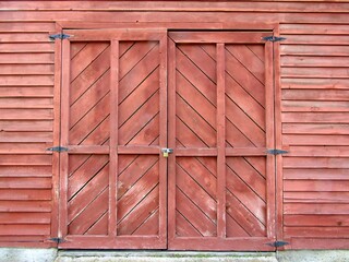 Stain wood exterior doors with black hinges