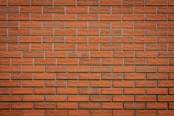 red clay brick wall, even rows of masonry