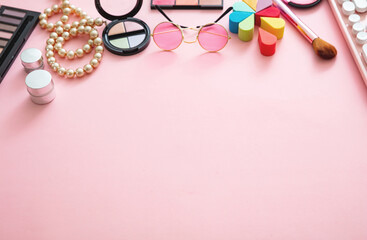 Obraz na płótnie Canvas Essentials fashion female accessories on pink background