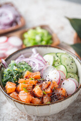colorful salmon poke bowl with vegetables