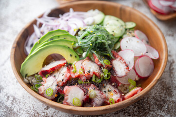 colorful octopus poke bowl with vegetables