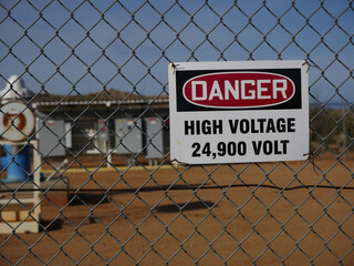 High voltage sign at an industrial complex