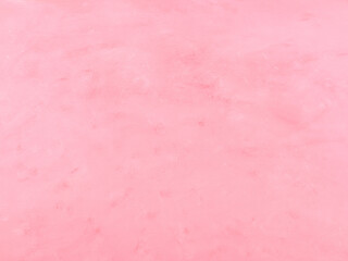 Strawberry ice cream pastel pink wooden textured background