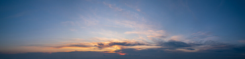 Naklejka na ściany i meble Sunset dusk sky with clouds (high resolution wide background panorama).