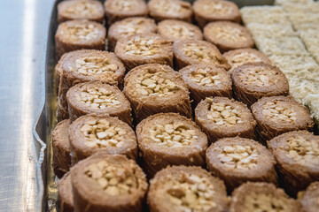 Close up on a plate with type of Arabic sweets in sweet shop in Lebanon