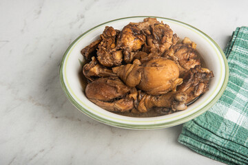 Filipino-Style Chicken Adobo Dish In Serving Bowl