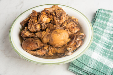 Filipino-Style Chicken Adobo Dish In Serving Bowl