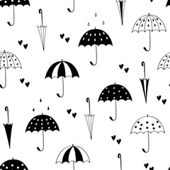 Seamless pattern with umbrellas and hearts. Black and white. Doodle style. Vector illustration. 