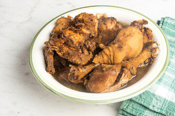 Filipino-Style Chicken Adobo Dish In Serving Bowl