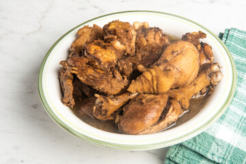 Filipino-Style Chicken Adobo Dish In Serving Bowl