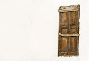 White painted wall and old wooden window