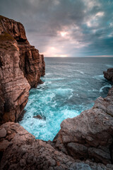rocky sunset cliff waves nice