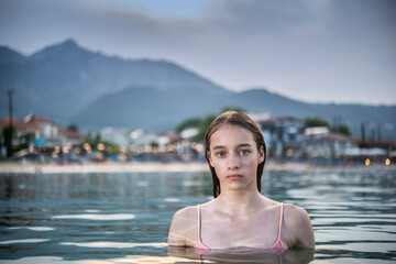 Fototapeta premium Portrait of a teenager swimming