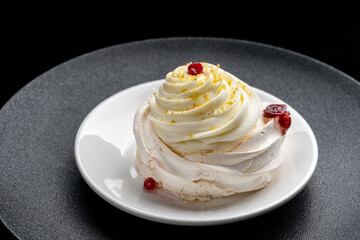 Pavlova meringue cake with fresh berries on black background-2.